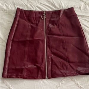 Red faux leather zip up skirt